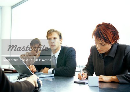 Business people working together at table
