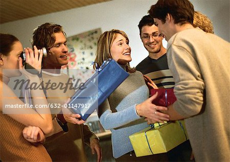 Group of people exchanging presents