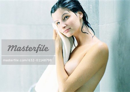 Premium Photo  Young beautiful woman wearing shower towel after bath