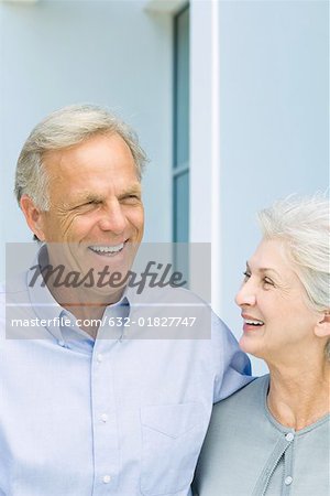 Mature couple smiling together, close-up