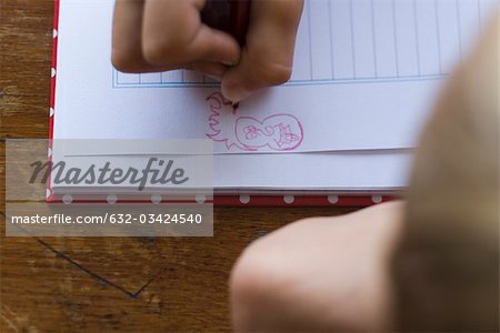 Doodling in notebook