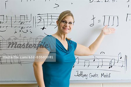 Woman teaching music theory class