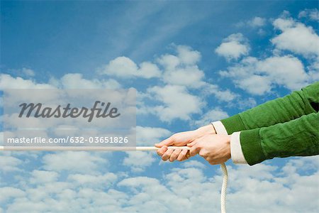 Person pulling end of rope - Stock Photo - Masterfile - Premium  Royalty-Free, Code: 632-03651826