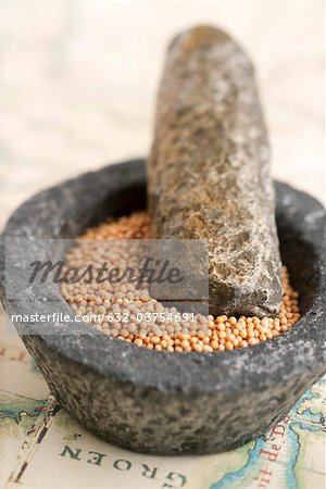 Peppercorns in mortar with pestle