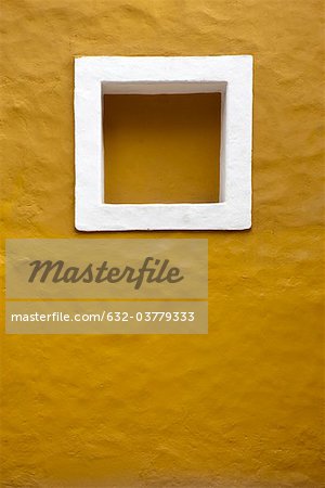 Square shaped inset on stucco wall