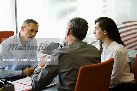 Businessman meeting with clients