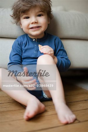 Little boy eating cookie, portrait