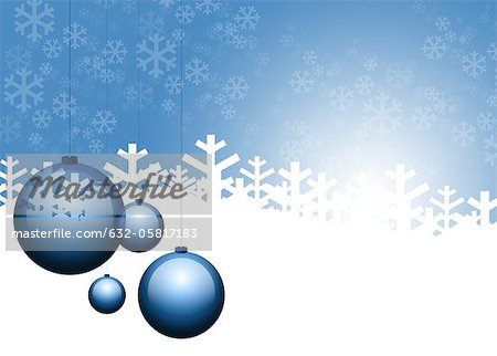 Christmas ornaments and snowflakes on blue background