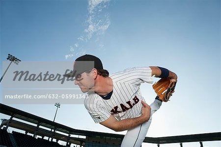 Baseball player pitching