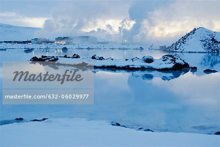 Iceland, Reykjanes Peninsula, Blue Lagoon geothermal spa, geothermal power plant in background