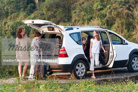 Family with SUV exploring the outdoors