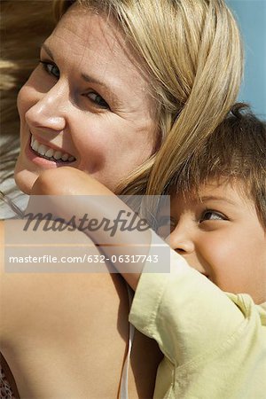 Mother and son spending time together outdoors, portrait