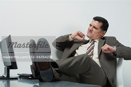 Guy Sitting Desk Feet Up Stock Photos - Free & Royalty-Free Stock