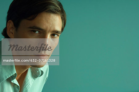 Man confidently looking at camera, portrait