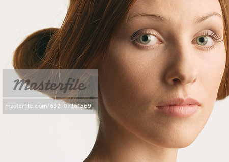 Woman with rolled up hairstyle