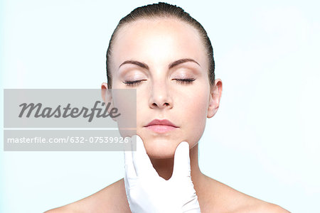 Woman receiving collagen injection