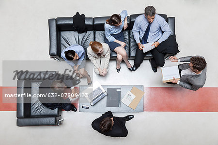 Executives in meeting, overhead view