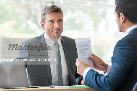 Businessmen in meeting Businessmen in meeting