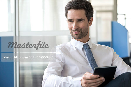 Businessman with digital tablet