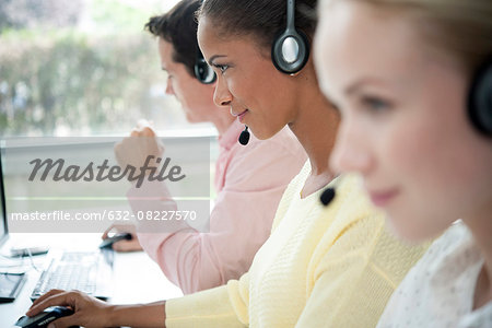 Telemarketers at work in call center