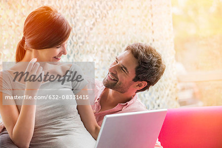 Couple making purchase online with credit card