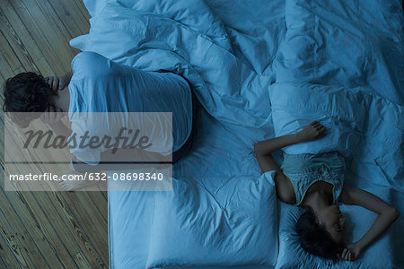 wife unaware A Husband Unaware That His Wife Is Listening Nearby Stock ...