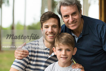 Mature man with son and grandson, portrait