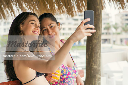 Women posing together for selfie