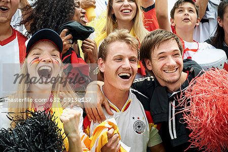 German football fans watching football match