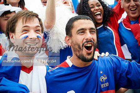 French football fans watching football match