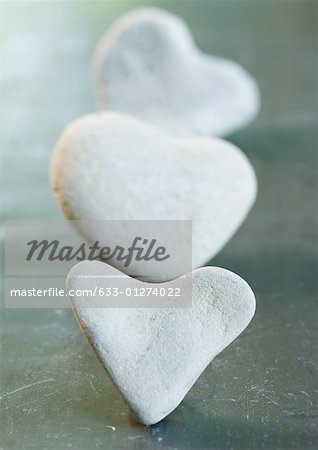 Heart shaped stones in line