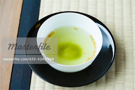 Cup of green tea, close-up