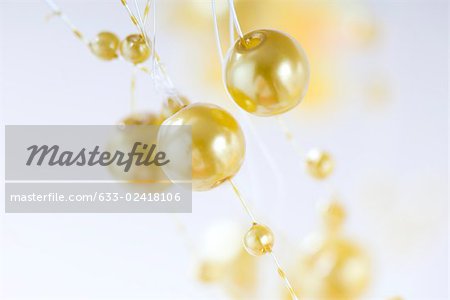 Decorative gold garland, close-up