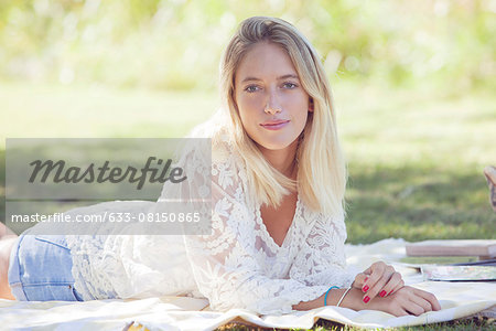 Woman daydreaming in park