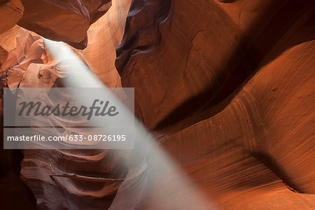 Beam of sunlight shining into Antelope Canyon, Arizona, USA