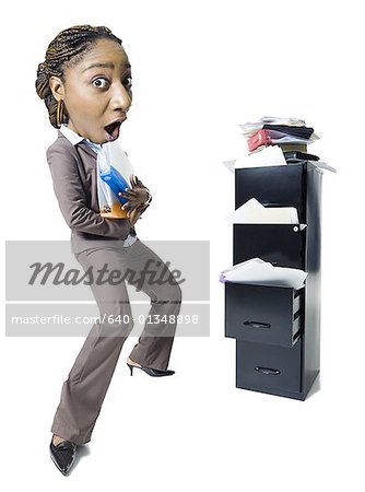 Portrait of a businesswoman holding files