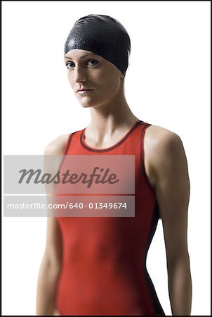 Portrait of a young woman standing in swimming gear
