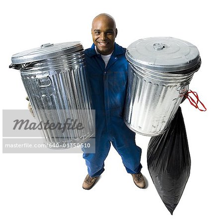 Garbage man with trash cans