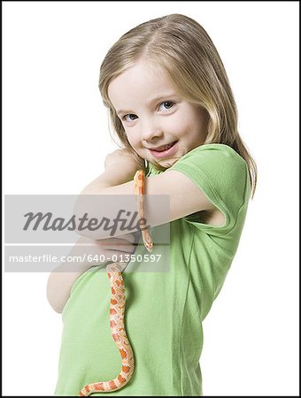 Portrait of a girl holding a snake