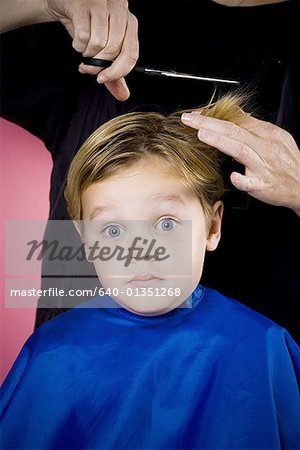 Boy having his hair cut