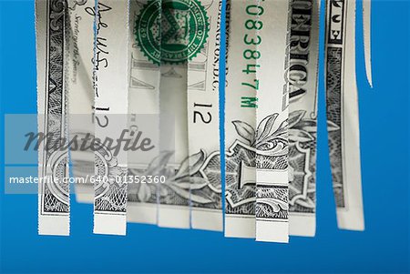 Shredded one dollar bill American currency