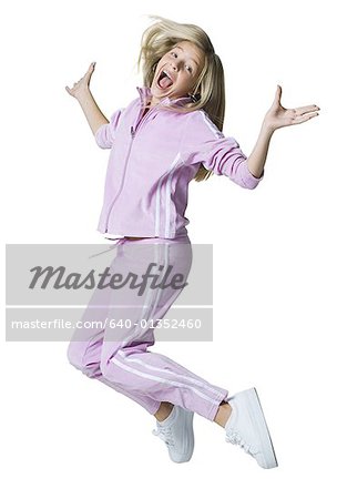 Portrait of a teenage girl jumping