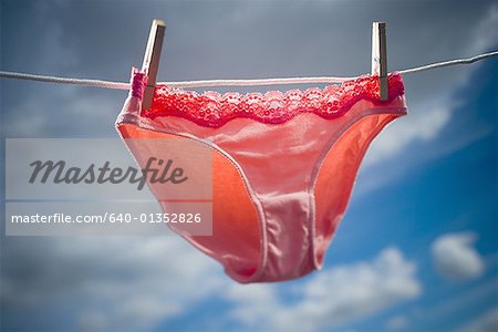 Low angle view of womens underwear hanging on a clothesline - Stock Photo -  Masterfile - Premium Royalty-Free, Code: 640-01352826