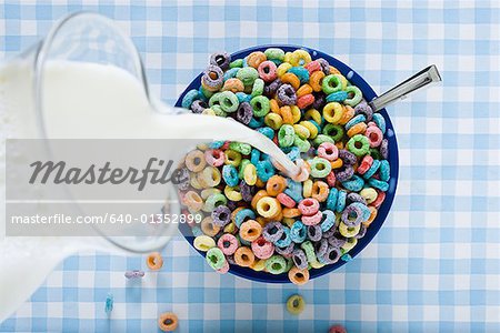 Download Milk Pouring From Jug Into Cereal Bowl Stock Photo Masterfile Premium Royalty Free Code 640 01352899 PSD Mockup Templates