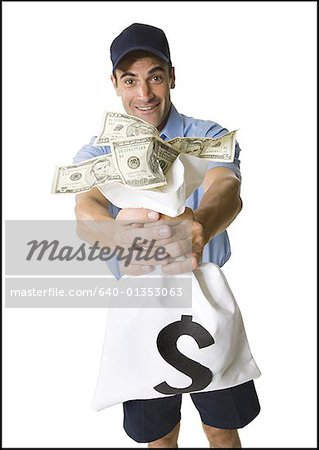 Portrait of a man holding a bag full of money