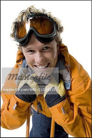 Portrait of a young skier smiling