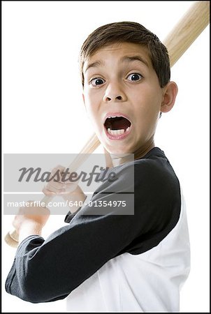 Portrait Of Little League Baseball Boy Holding Bat. Stock Photo, Picture  and Royalty Free Image. Image 20509060.