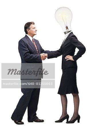 Businesswoman with light bulb instead of head shaking hands with mature businessman