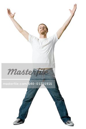 Portrait of a young man with his arms outstretched