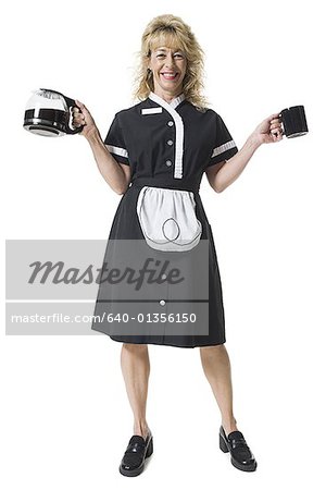 https://image1.masterfile.com/getImage/640-01356150em-waitress-serving-coffee-stock-photo.jpg